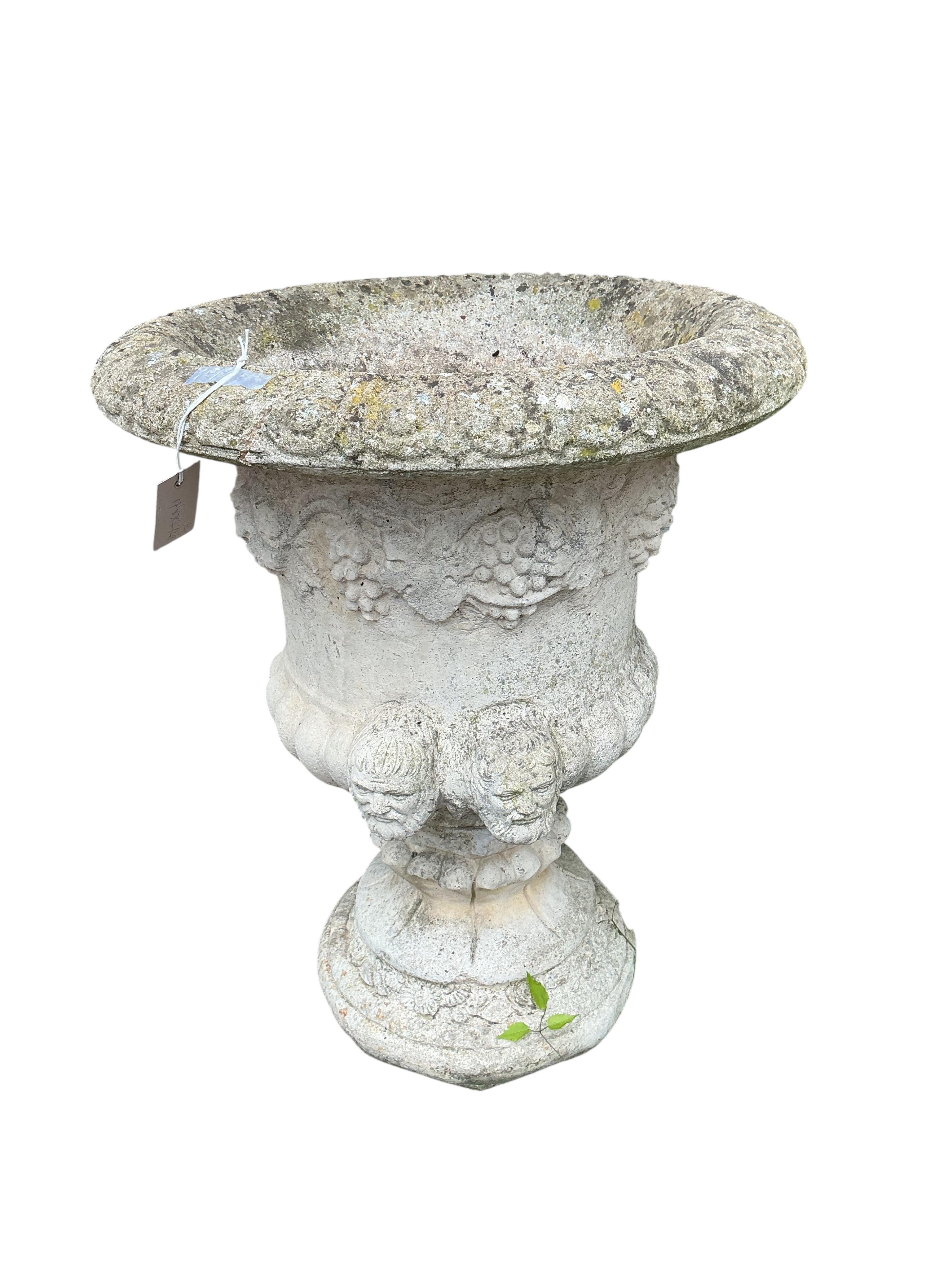 A pair of reconstituted stone campana garden urns, diameter 55cm, height 66cm